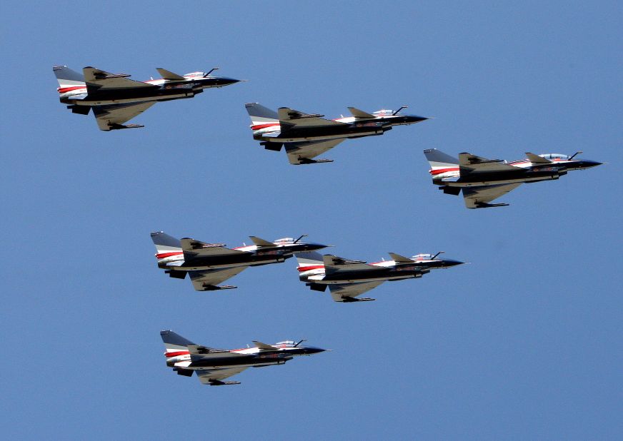 China's J-10 fighter jets perform during the 2010 airshow on November 17, 2010. The day before the show China won orders for 100 of its large, domestically built passenger jets, challenging industry giants Airbus and Boeing in what will soon be the world's largest aviation market. 