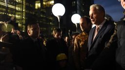 Berlin's Mayor Klaus Wowereit (2nd R) and Moritz van Duelmen (R), director of cultural not-for-profit organization Kulturprojekte Berlin attend the start of the light installation Lichtgrenze (Light border) on the course of the former Berlin wall in Berlin on November 7, 2014. Germany kicked off celebrations of the 25th anniversary of the epochal fall of the Berlin Wall Friday, set to culminate in rock stars and freedom icons joining millions at an open-air party. AFP PHOTO / TOBIAS SCHWARZTOBIAS SCHWARZ/AFP/Getty Images