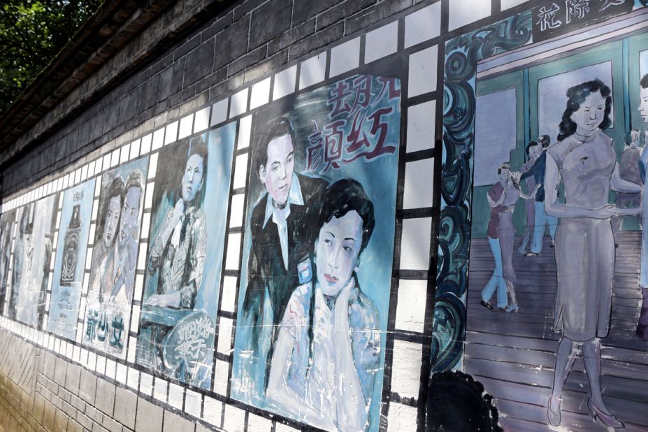 Numerous vintage posters decorate the walls in Anren's old town center. Buildings in the area feature well-preserved architecture and murals.