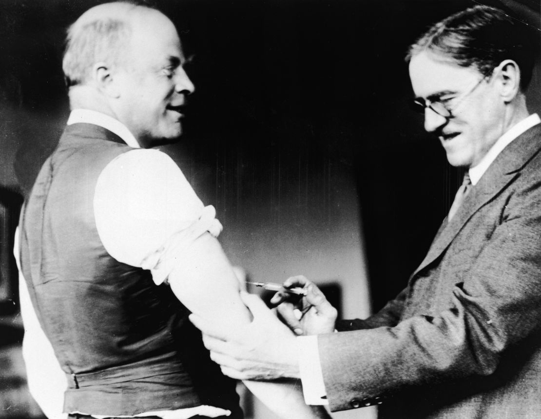 A doctor inoculates Boston Mayor Andrew James Peters against the Spanish flu in 1918.