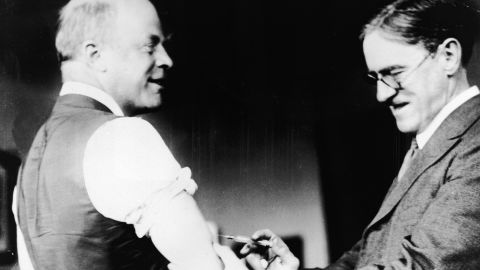 A doctor inoculates Boston Mayor Andrew James Peters against the Spanish flu in 1918.