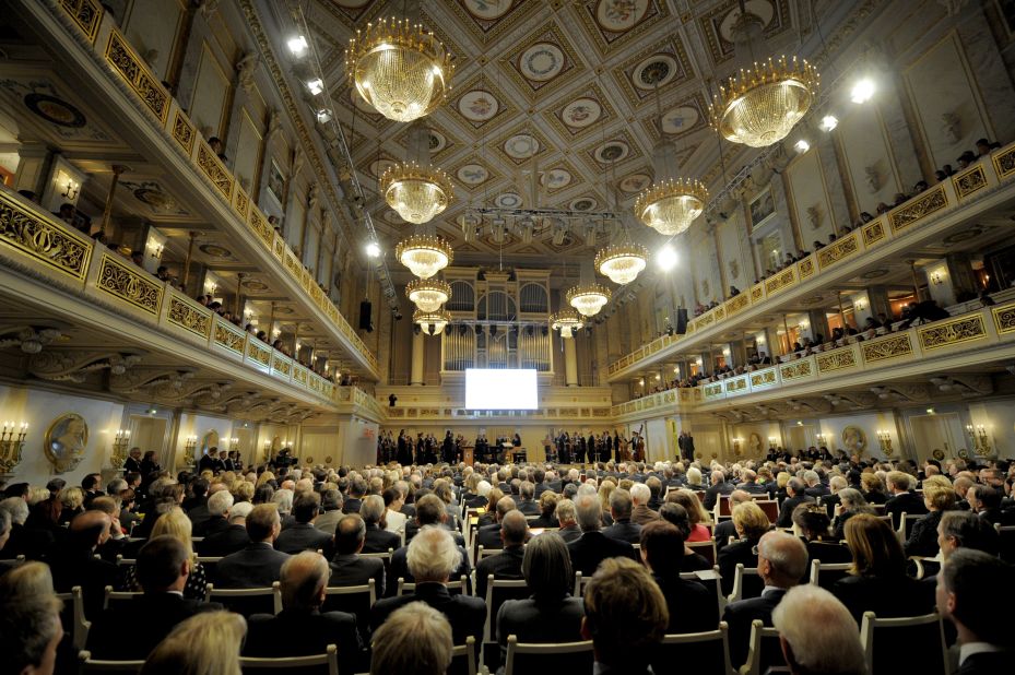 Guests attend a ceremony organized by the Berlin Senate to mark the anniversary at the Gendarmenmarkt Konzerthaus in Berlin.  