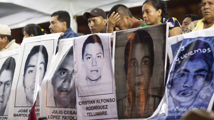 MEXICO CITY, MEXICO - NOVEMBER 5: Families of 43 missing students from Guerrero State in Mexico protest the government and demand answers of the missing students on November 5, 2014 in Mexico City, Mexico. The students have been missing since September 26, 2014 and are from the Atyotzinapa teaching college in Iguala, Mexico. (Photo by Brett Gundlock/Getty Images)