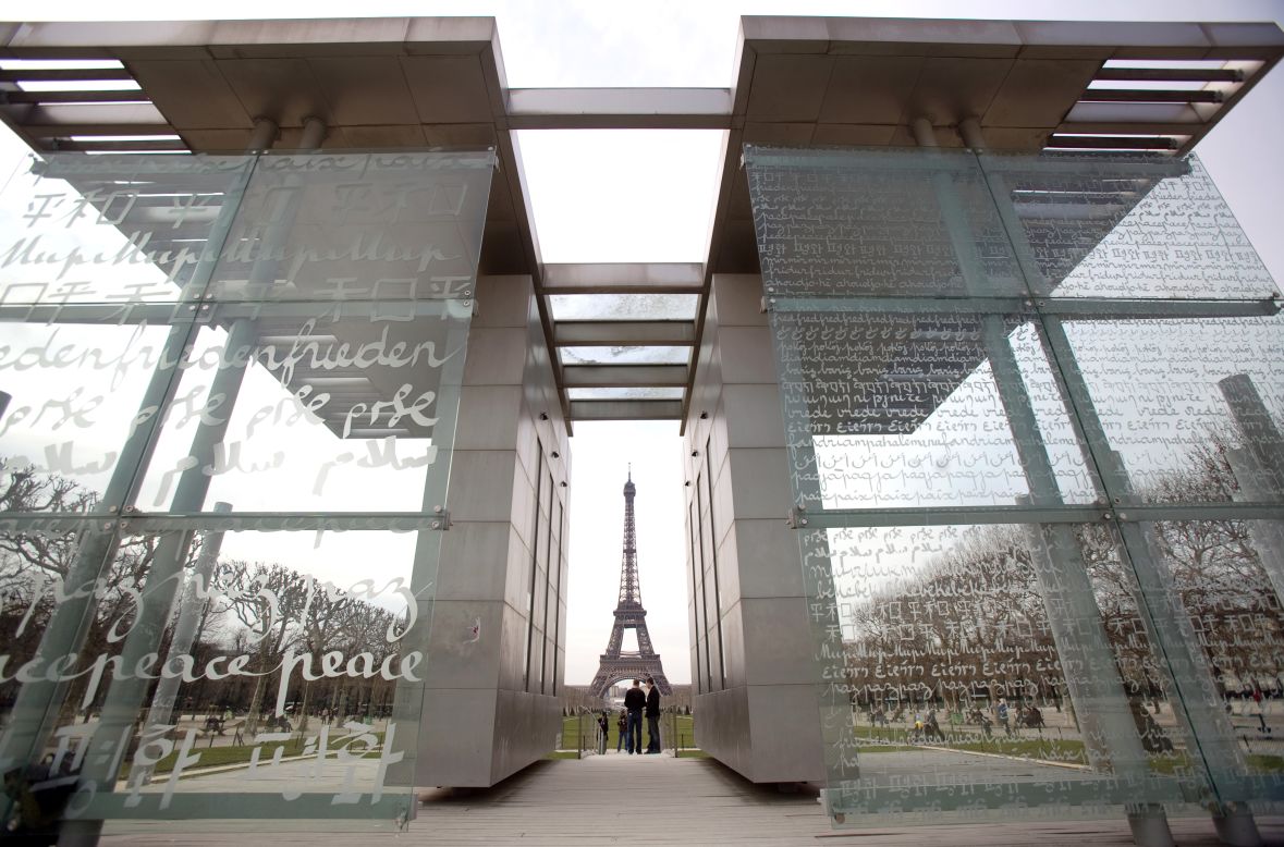 <strong><em>Peace Wall by Clara Halter and Jean-Michel Wilmotte, Paris, 2000</em></strong><br /><br />Whereas monuments once tended to celebrate tremendous victories, since WWI the emphasis has been to commemorate loss or to call for peace. (<em>The Peace Wall</em> in Paris, created by artist Clara Halter and architect Jean-Michel Wilmotte, attempts the latter by repeating the word "peace" in 32 languages). <br /> <br />After the incredible loss of WWI, imposing structures -- classically inspired arches and obelisks -- provided a place to focus one's grief, especially when bodies weren't sent home.<br />    <br />"They had to be in stone, marble or bronze because people wanted something of permanence," explains Paul Gough, a professor of art history at <a href="http://www.rmit.com/" target="_blank" target="_blank">RMIT University</a> in Melbourne, Australia. "They wanted something that was heroic and larger than life that could somehow symbolize that the dead had died for something other than just a common cause."        
