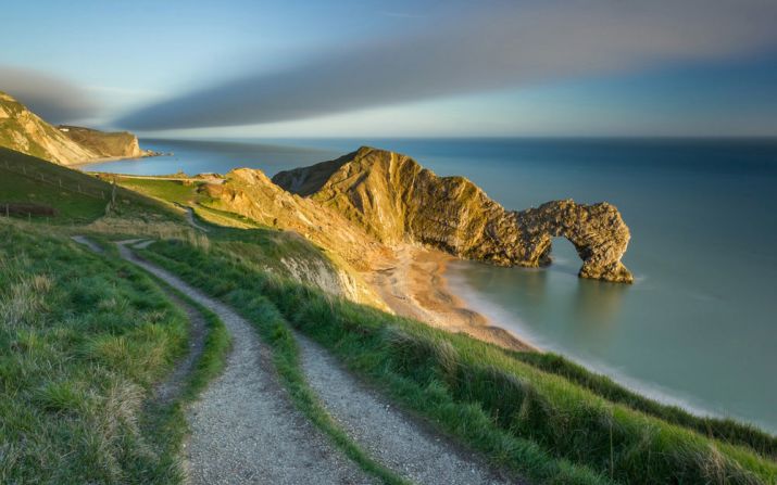 This image by Jake Pike is titled "The last of the evening light on Durdle Door." <br /><br />It shows England's so-called Jurassic Coast in the southern county of Dorset.<br /><br />The crumbling Jurassic Coastline is a favorite among fossil hunters, yielding many paleontological treasures.