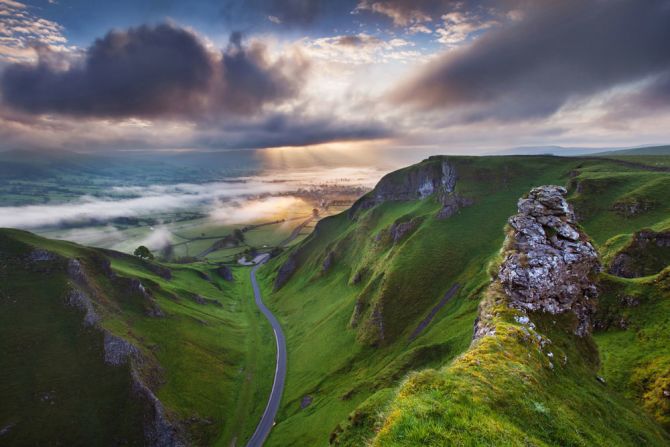 "Sunrise at Winnats Pass," by German photographer Sven Mueller shows rugged scenery in the central county of Derbyshire.<br /><br />It won the "You're Invited Award," sponsored by UK tourism agency Visit Britain, for the best image from an overseas entrant.