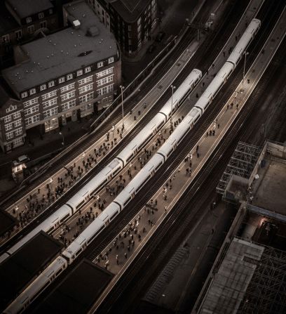 This almost timeless monochrome image shows trains and passengers at London Bridge Station, one of the busy rail stops serving the UK capital.<br /><br />Taken by Stephen Bright, the image won the "Lines in the Landscape" award.