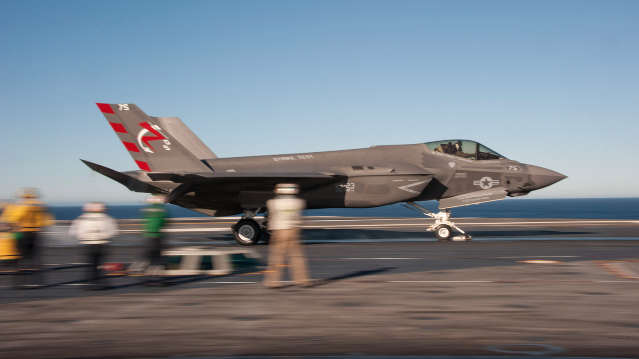 An F-35C is launched from a catapult aboard the USS Nimitz.