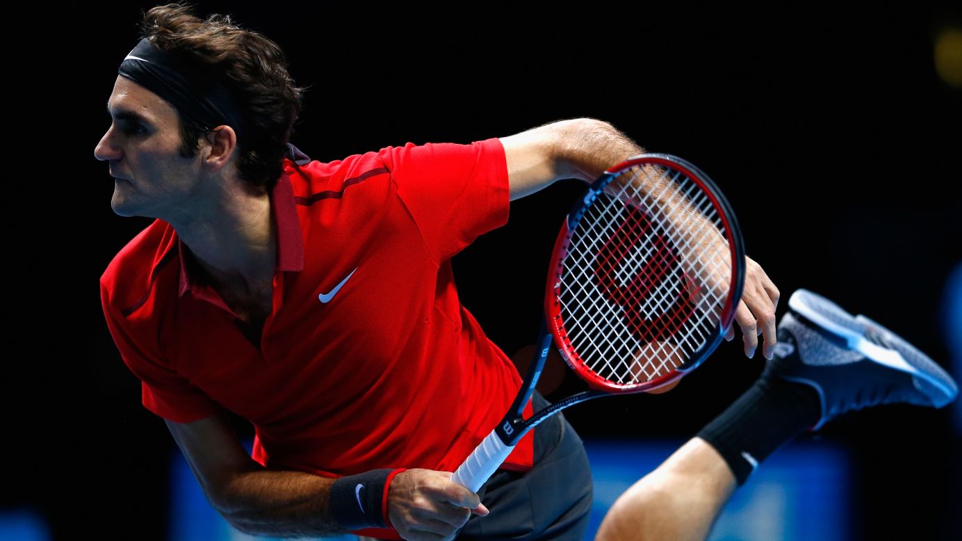 Roger Federer of Switzerland plays against Milos Raonic of Canada in the round robin on Day 1 of the Barclays ATP World Tour Finals at O2 Arena in London on Sunday, November 9. Federer beat Raonic 6-1, 7-6.