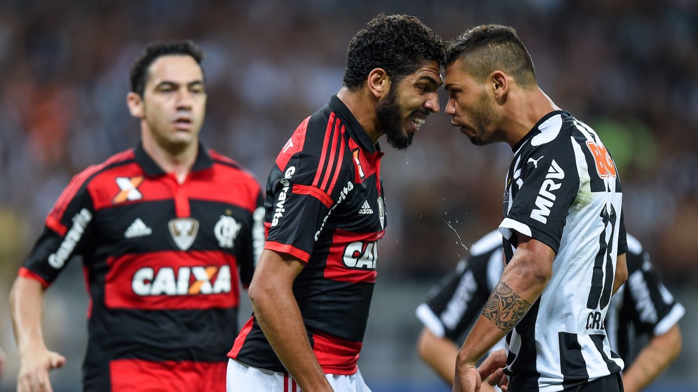 Carlos of Atletico MG and Wallace of Flamengo battle for the ball during a 2014 Copa do Brasil match at Mineirao Stadium in Belo Horizonte, Brazil, on Wednesday, November 5.