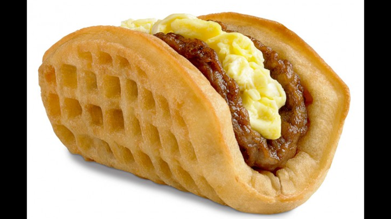 Taco Bell debuted its breakfast menu in 2014 with its marquee item, the Waffle Taco. It's pretty much what it sounds like if you consider taco shells and waffles interchangeable vehicles for eggs and breakfast meats. As one headline summed it up, "<a href="index.php?page=&url=http%3A%2F%2Fwww.slate.com%2Fblogs%2Fmoneybox%2F2014%2F09%2F05%2Ftaco_bell_breakfast_menu_the_biscuit_taco_joins_the_waffle_taco.html" target="_blank" target="_blank">Taco Bell Tacos Keep Getting Less and Less Taco-Like</a>." 