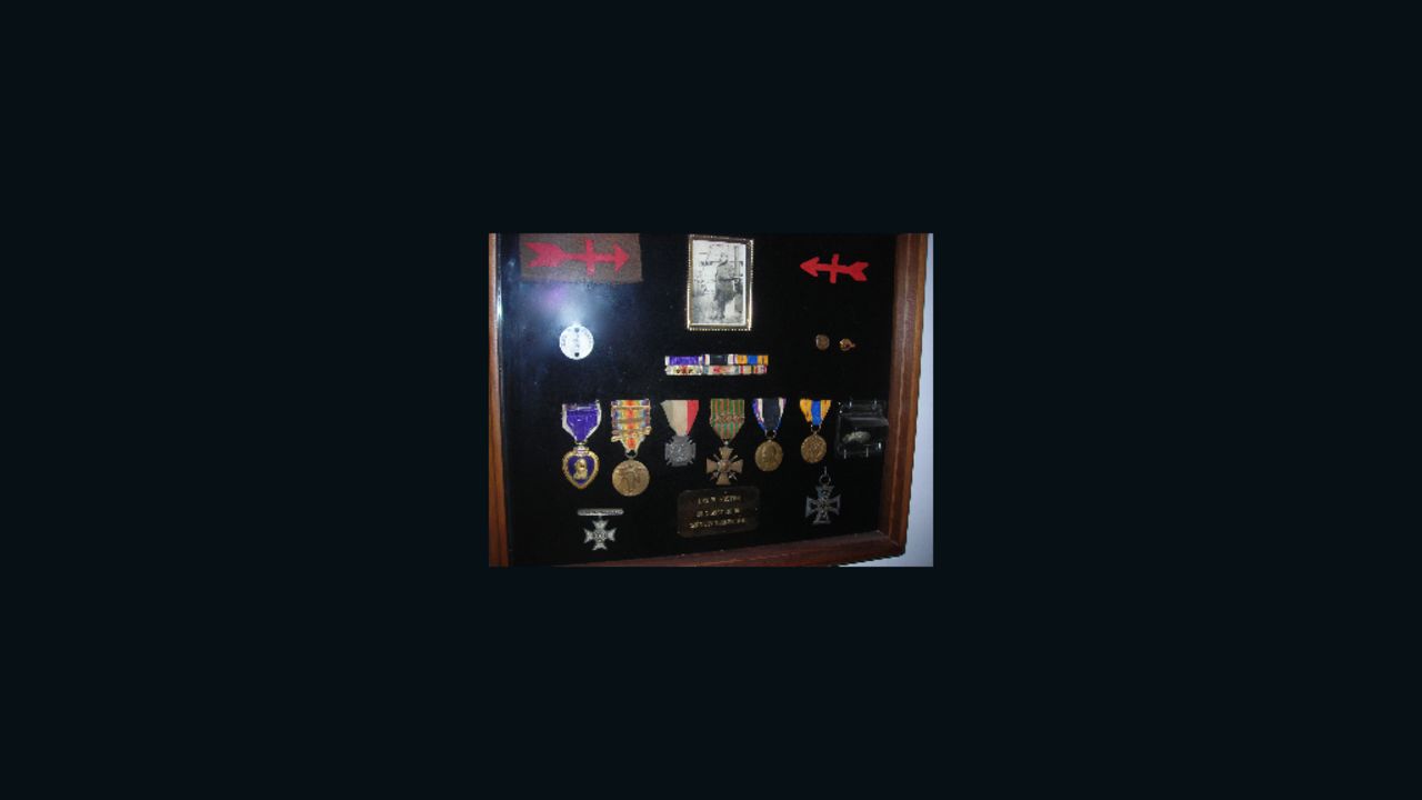 A shadowbox contains Leo Foster's medals earned during his service in World War I.