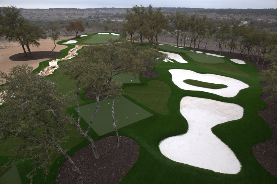 Pelz's Austin backyard features a range of greens -- some of them replicas of world famous courses. It is low maintenance too; the grass is synthetic and never requires cutting or watering.