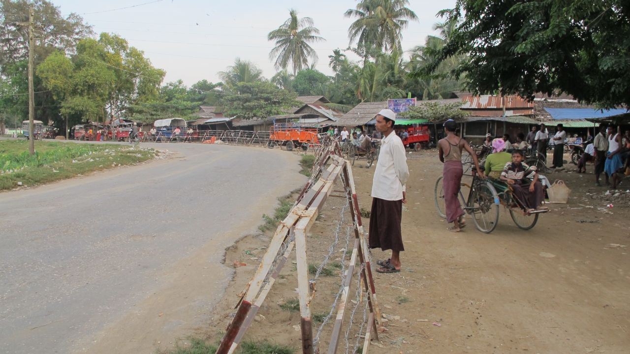 Rohingya, encamped in areas they are prohibited from leaving, are unable to seek work or access education or health services in the city, just a few hundred meters away.