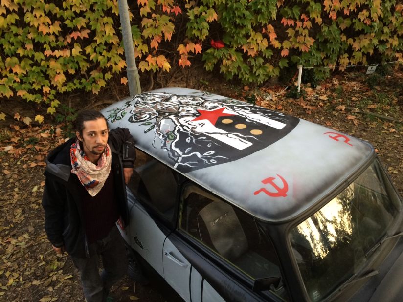 Raumberger sketched several of Berlin's most famous symbols on CNN's Trabi, including the broadcast tower and the Brandenburg Gate. He also drew a tree of people breaching the Berlin Wall, a symbol of human life penetrating and destroying the anti-human barrier that separated East and West Germany. 