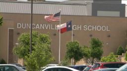 A school district spokeswoman says the tweets are not representative of the high school's staff.