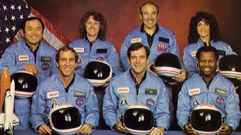 Space Shuttle Challenger crew members (Back, L-R) Mission Specialist Ellison S. Onizuka, Teacher-in-Space participant Sharon Christa McAuliffe, Payload Specialist Greg Jarvis and mission specialist Judy Resnick. (Front, L-R) Pilot Mike Smith, commander Dick Scobee and mission specialist Ron McNair. 