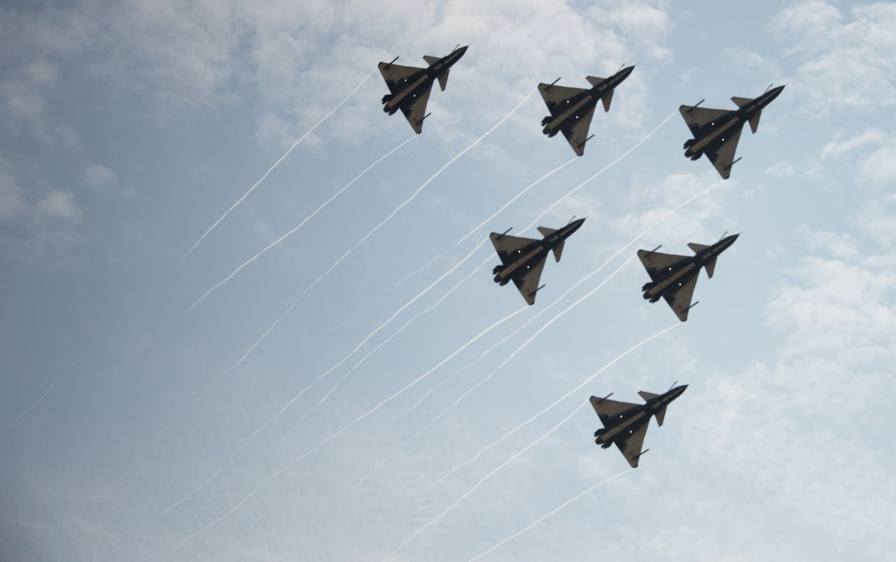 J-10 fighter jets of the Bayi Aerobatic Team of the Peoples Liberation Army Air Force perform during the air show on Tuesday, November 11, 2014. 