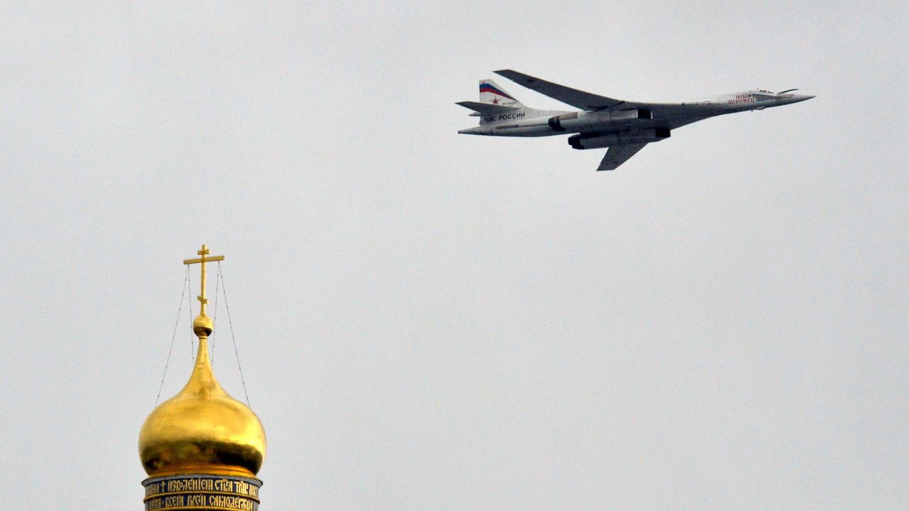 Caption:A Russian Tupolev Tu-160 supersonic strategic bomber flies above the Kremlin's cathedrals in Moscow, on May 7, 2014, during a rehearsal of the Victory Day parade. Russia celebrates the1945 victory over Nazi Germany on May 9. AFP PHOTO / YURI KADOBNOV (Photo credit should read YURI KADOBNOV/AFP/Getty Images)
