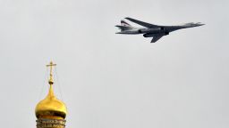 Caption:A Russian Tupolev Tu-160 supersonic strategic bomber flies above the Kremlin's cathedrals in Moscow, on May 7, 2014, during a rehearsal of the Victory Day parade. Russia celebrates the1945 victory over Nazi Germany on May 9. AFP PHOTO / YURI KADOBNOV (Photo credit should read YURI KADOBNOV/AFP/Getty Images)