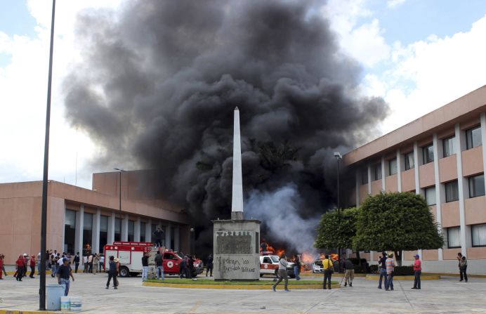 Protesters angry at the apparent <a href="http://www.cnn.com/2014/10/05/americas/gallery/mexico-missing-students/index.html" target="_blank">death of 43 students</a> torched vehicles in front of the state Congress building in Chilpancingo, Mexico, on Wednesday, November 12. The students disappeared in southern Mexico in September. <a href="http://www.cnn.com/2014/11/10/world/americas/mexico-missing-students-impact/index.html">Authorities say they were abducted</a> by police on order of a local mayor, then turned over to a gang that's believed to have killed them and burned their bodies before throwing some remains in a river.<br />