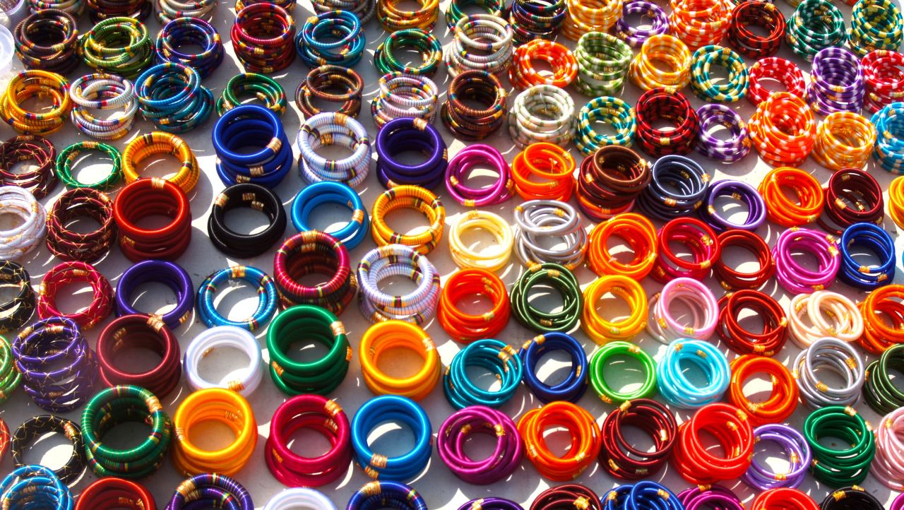 <a href="http://ireport.cnn.com/docs/DOC-1182176">Colorful bangles</a> fill a street vendor's table in Jaipur, India.
