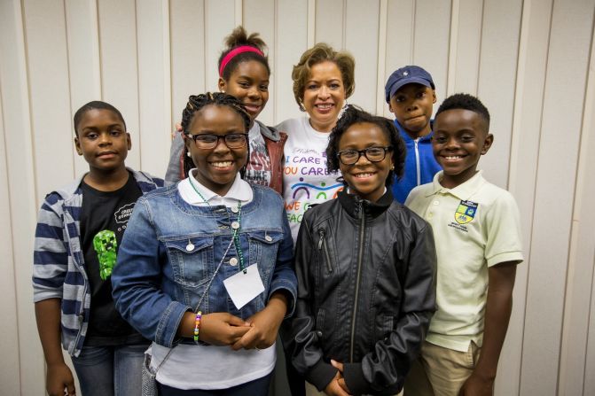  March-Grier poses with some of the program's participants.