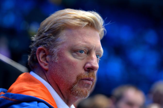 Djokovic's coach Boris Becker is in pensive move as he watches his charge complete another emphatic victory at the 02 Arean.