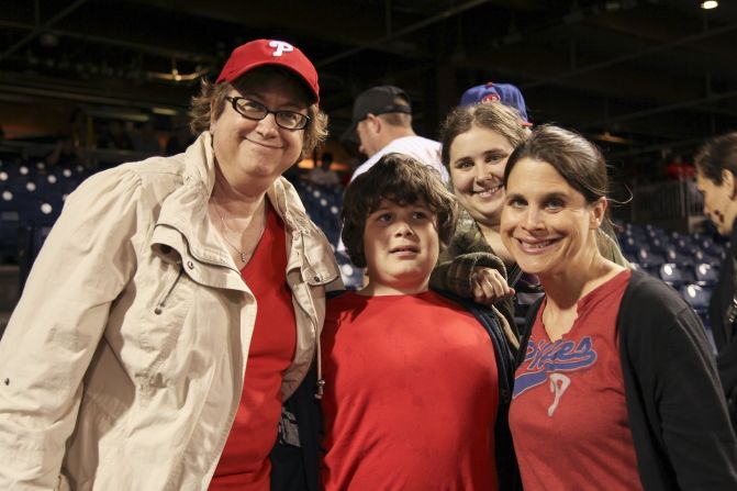 Ross, far right, partnered with the Philadelphia Phillies in 2012 to develop a program through which game-day employees learn about autism and how to interact with individuals on the spectrum so that families feel supported during baseball game outings.