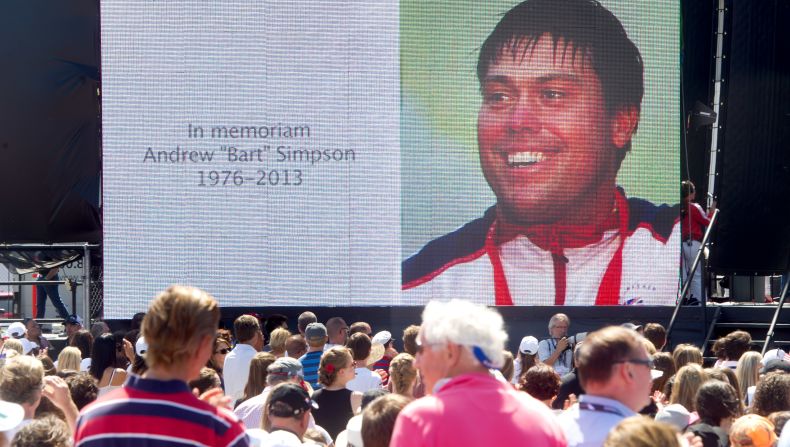 A big screen portrays a memorial for tragic Artemis Racing and GB sailor Andrew Simpson who died in a training accident ahead of the 2013 America's Cup.