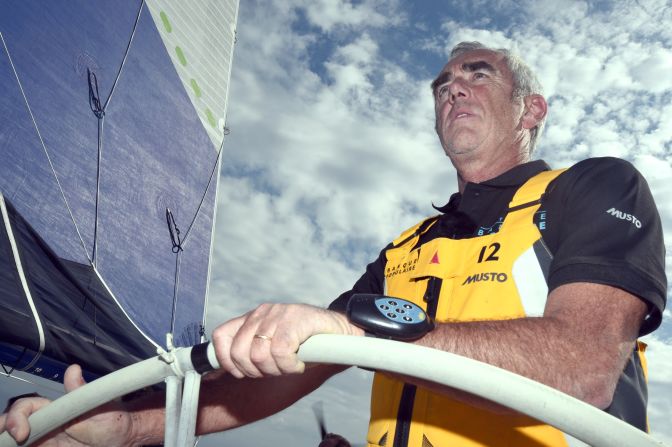 Loick Peyron at the helm of the trimaran Banque Populaire ahead of winning the Route du Rhum single handed transatlantic race in a record time.