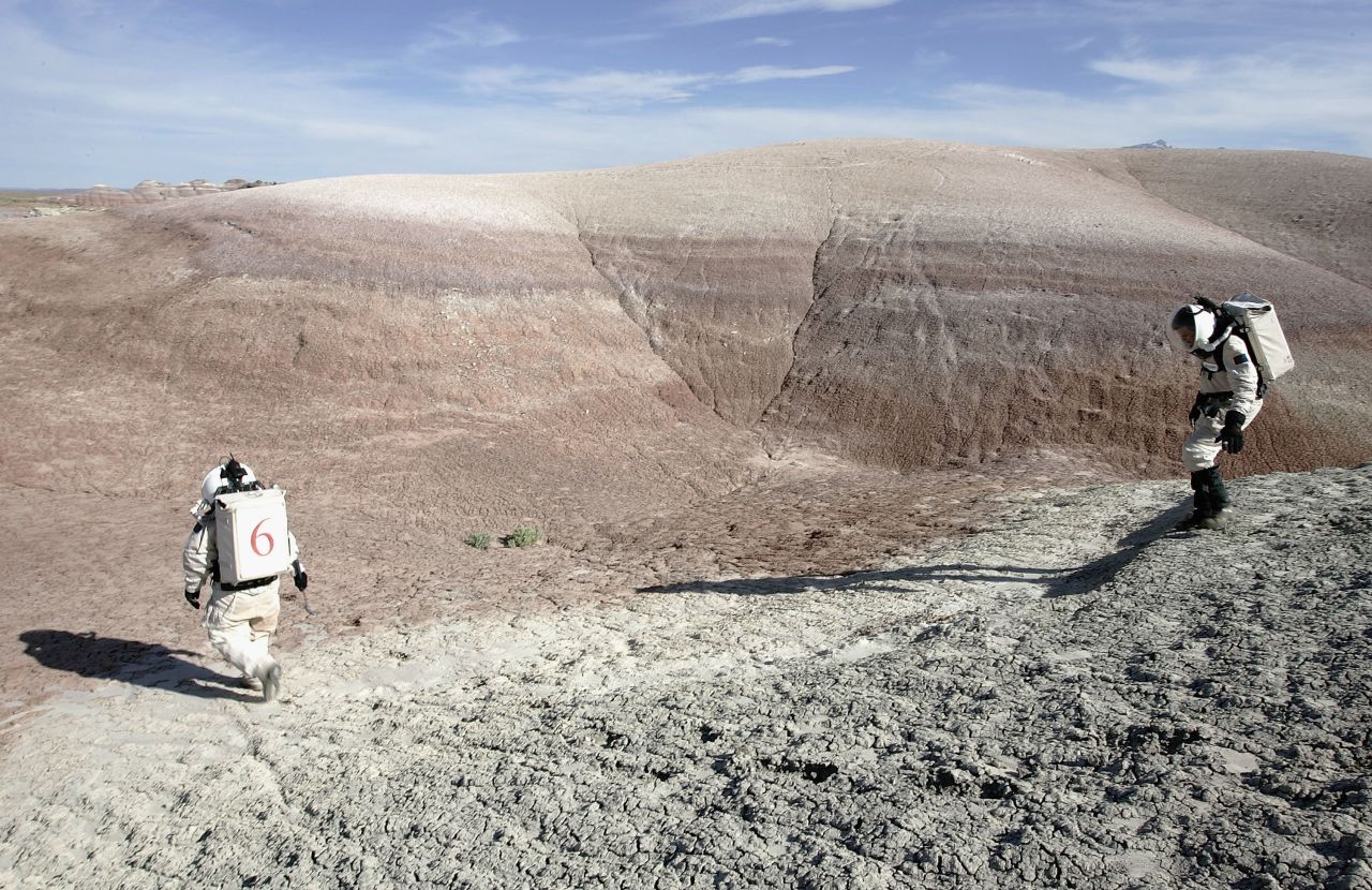 Could humans walk on Mars? NASA chief scientist, Dr Ellen Stofan, wants to land people on the "Red Planet" by the mid-2030s. It's likely to be tougher than this image of researchers at the Mars Desert Research Station in Utah, sponsored by the Mars Society.