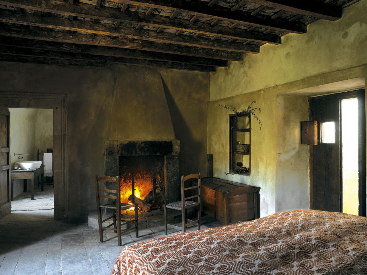 The Sextantio hotel's 29 rooms are restyled wood and stone dwellings.
