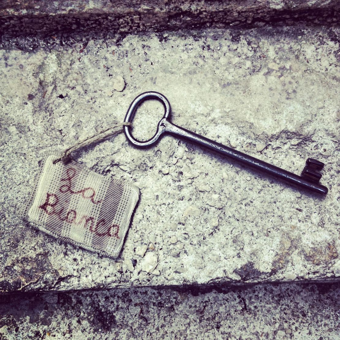 A huge iron key opens one of the rooms at the Sextantio hotel.