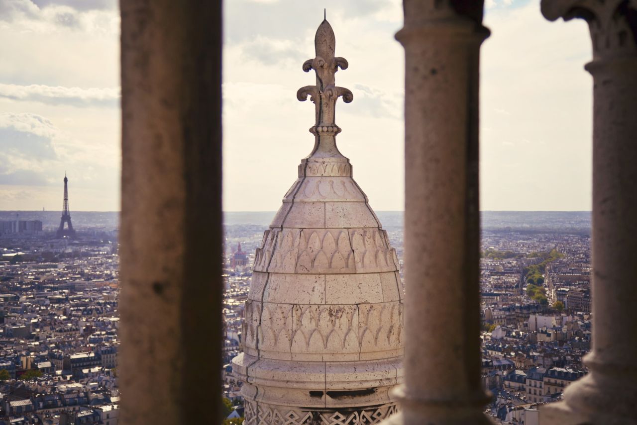 A trip to Paris isn't complete without a visit to the <a href="http://ireport.cnn.com/docs/DOC-850054">Sacre-Coeur Basilica</a>, which -- besides being a beautiful, historic church -- affords stunning vistas of the city of lights.