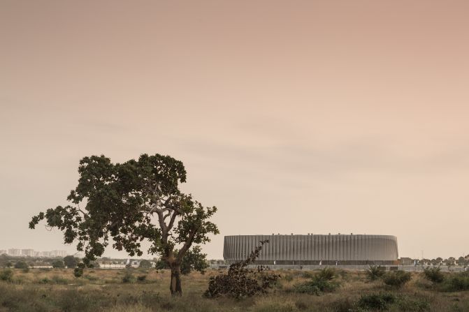 Shortlisted in the sports category at this year's World Architecture Festival, the Luanda Multisports Pavilion, in Angola may not appear particularly striking during the day...