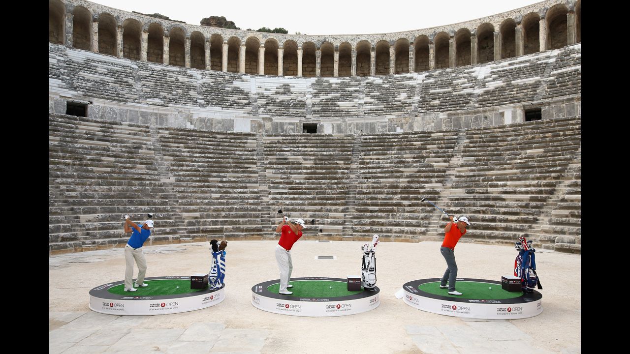 From left, pro golfers Sergio Garcia, Lee Westwood and Henrik Stenson try to hit over the towering walls of the 2,000-year-old Aspendos amphitheater Tuesday, November 11, in Antalya, Turkey. The publicity event was held ahead of the Turkish Airlines Open. 