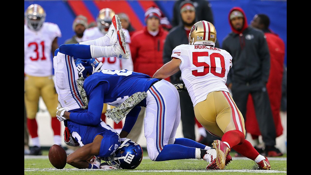 Rueben Randle, left, collides with New York Giants teammate Larry Donnell during the team's 16-10 loss to San Francisco on Sunday, November 16.