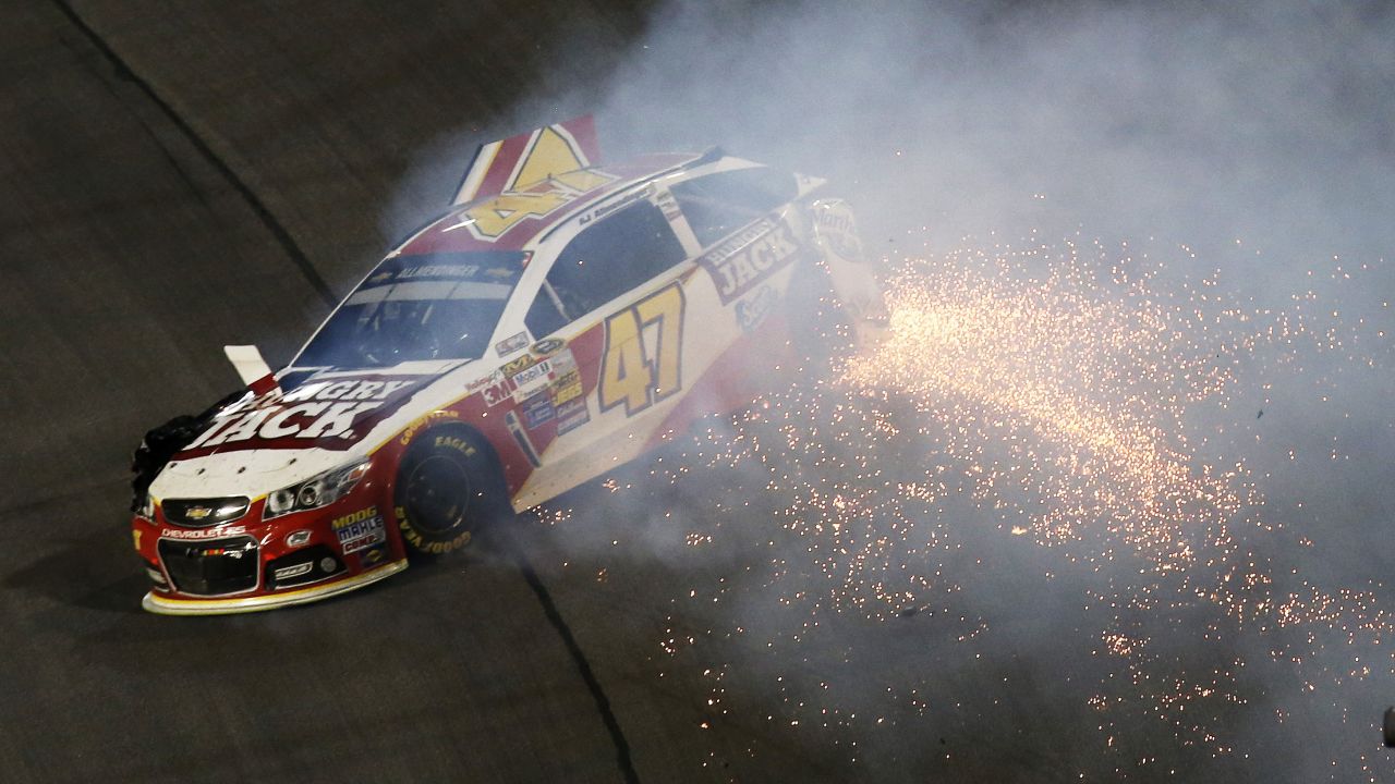 NASCAR driver A.J. Allmendinger wrecks during the season's final Sprint Cup race Sunday, November 16, in Homestead, Florida. Kevin Harvick won the race to clinch his first Sprint Cup championship.  