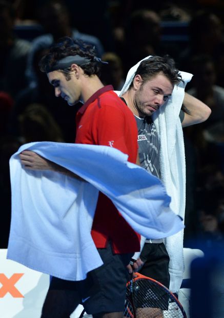 After Roger Federer's tight three-set win over Stan Wawrinka, right, at the World Tour Finals, talk of a division between the two Swiss ahead of this weekend's Davis Cup final against France surfaced. 