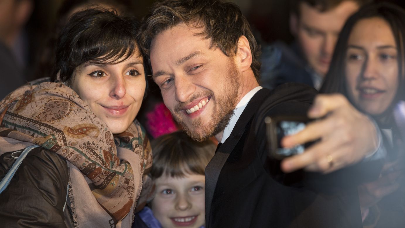 Actor James McAvoy snaps a selfie with fans in Glasgow, Scotland, ahead of the Scottish BAFTA awards on Sunday, November 16.