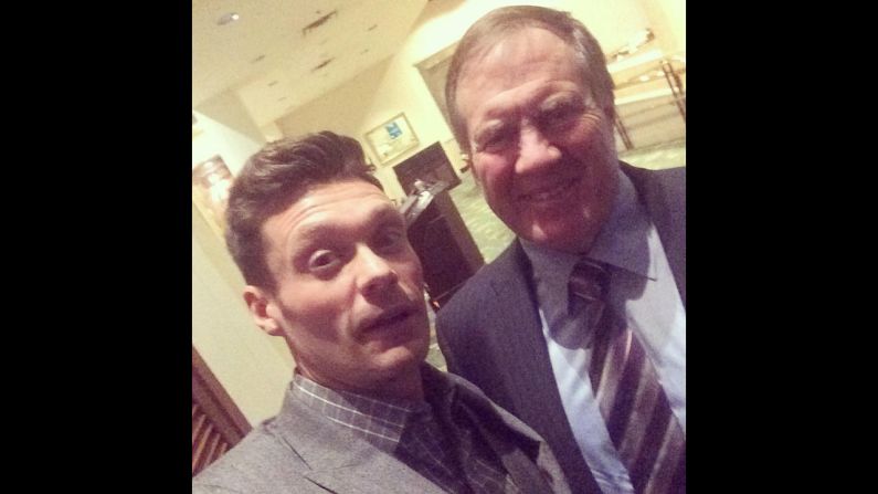 Television host Ryan Seacrest, left, gets a smile out of Bill Belichick, the usually dour coach of the NFL's New England Patriots, on Friday, November 14. "Thx coach for coming out to support @ryanfoundation," <a href="https://twitter.com/RyanSeacrest/status/533268994552528896" target="_blank" target="_blank">Seacrest tweeted.</a>