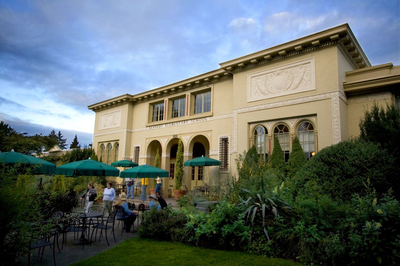 No, you're not that far gone yet. You really are about to drink a beer in an institutional learning facility from Portland beer touchstone McMenamin's, which converted Kennedy School into a pub, hotel, theater and restaurant.