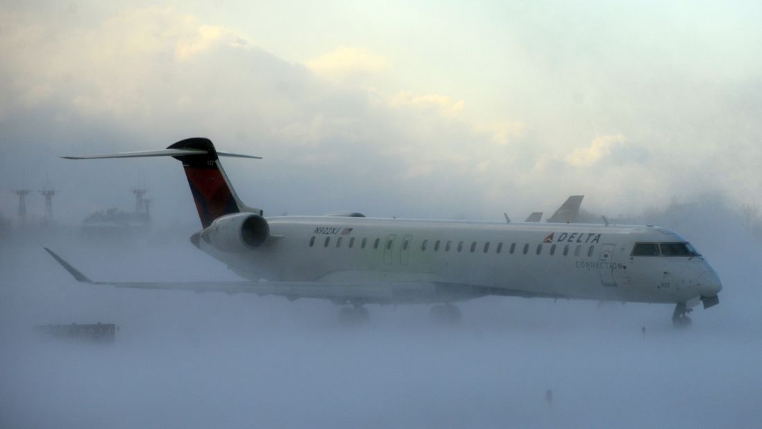A plane negotiates its way through the snow at Buffalo Niagara International Airport on November 18. All 50 states registered temperatures below freezing Tuesday morning.