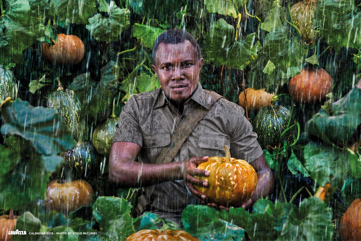 27-year-old Kenyan John Kariuki Mwangi assumes a protective pose, like that of a soldier fighting to preserve his environment. Mwangi is the vice president of the Slow Food Foundation for Biodiversity. McCurry posed him with the pumpkins of Lare, Kenya, which thrive in the region despite highly irregular rainfall.