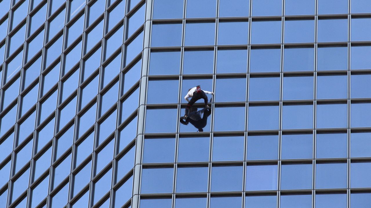<a href="http://www.cnn.com/2010/WORLD/europe/04/20/alain.robert.profile/index.html">Alain Robert</a>, known as the "French Spider-Man," scales a 610-foot skyscraper in Paris' La Defense district. Often forgoing ropes and harnesses, Robert has established himself as one of the world's best free solo climbers. He has racked up numerous arrests and a few serious injuries along the way.