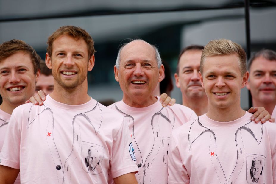 With Alonso linked to a McLaren return, the future of the team's current drivers Jenson Button (left) and Kevin Magnussen (right) lies in the hands of McLaren chairman Ron Dennis (center.)
