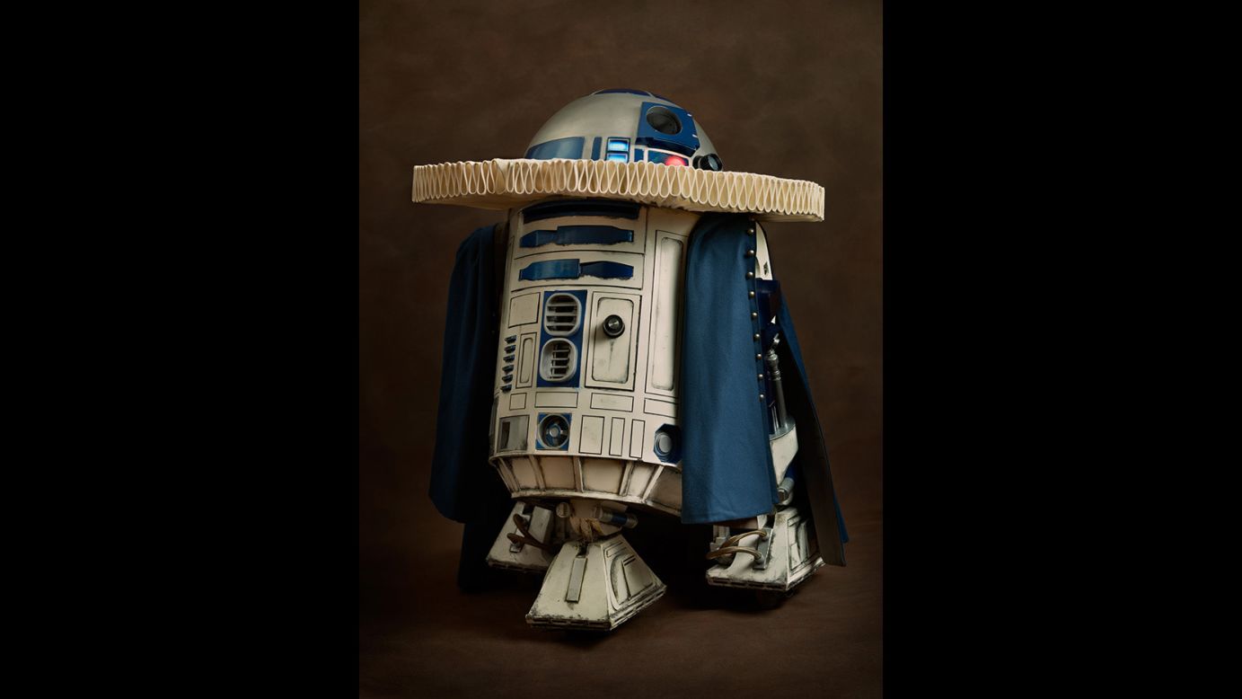 R2-D2, who probably doesn't need a ruffled neckpiece to help save his human counterparts.
