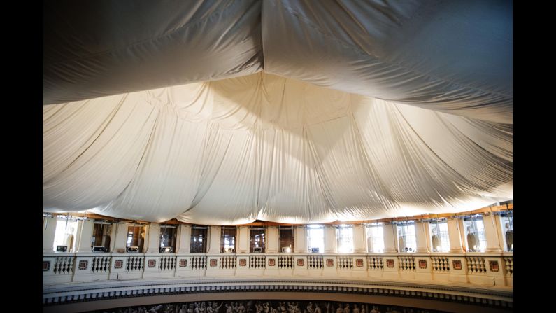 A doughnut-shaped protective net hangs from the ceiling of the U.S. Capitol's rotunda Tuesday, November 18, in Washington. The Capitol's famous dome is being renovated.