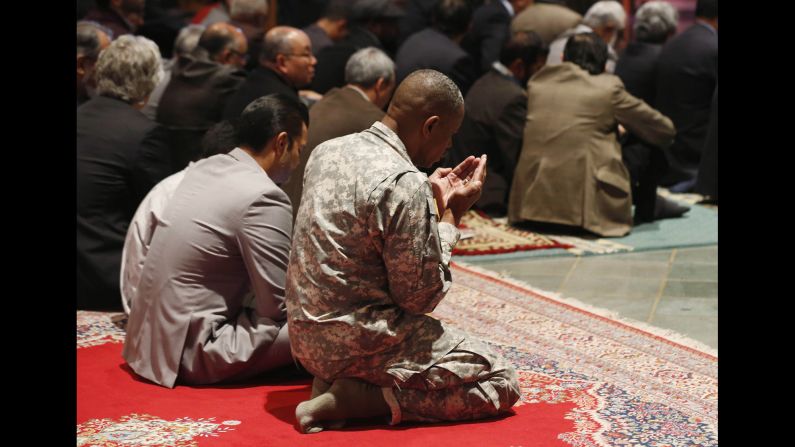 A U.S. Army soldier prays at the Washington National Cathedral, which was hosting its first Muslim prayer service on Friday, November 14.